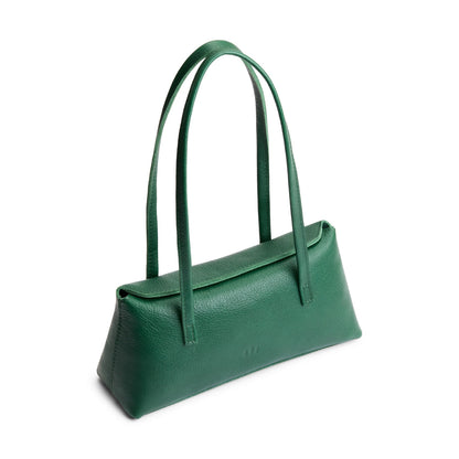 Bacalar | Leather bowler bag with magnetic closure against a white background