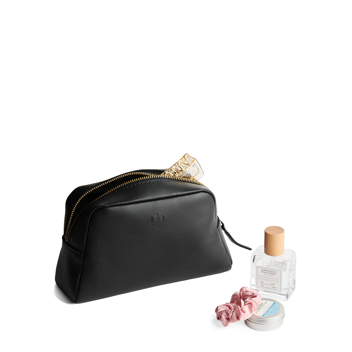 Black | Trapezoid pouch with leather zipper pull