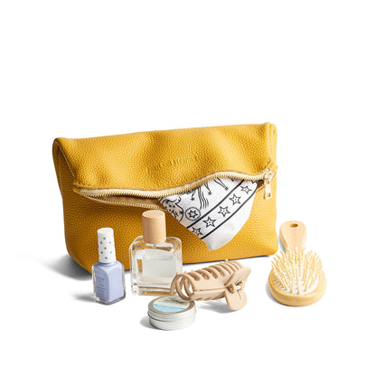 Sunshine | Closed folded zipper pouch with items