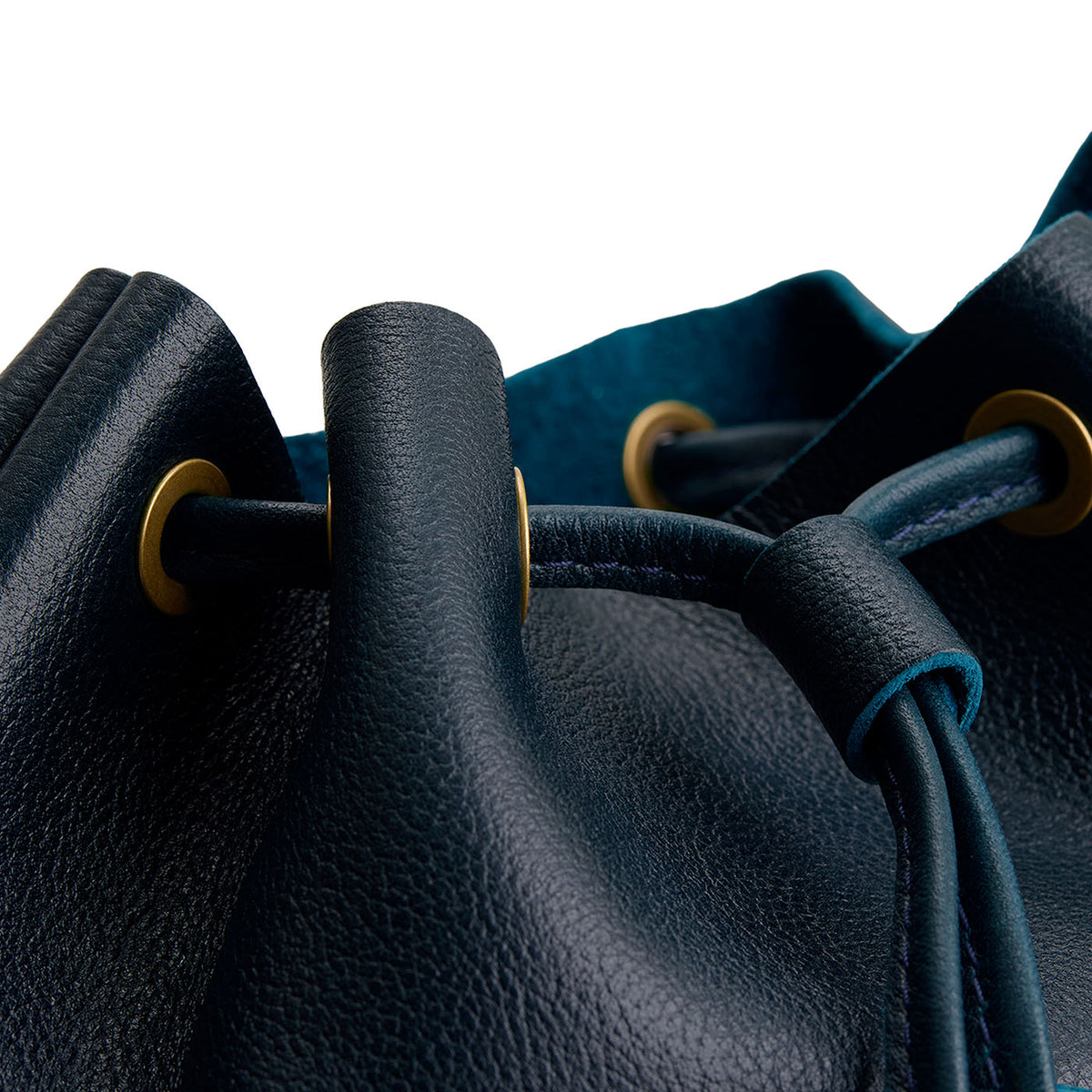 Boreal | Close-up of slouchy crossbody bag with leather drawstring closure