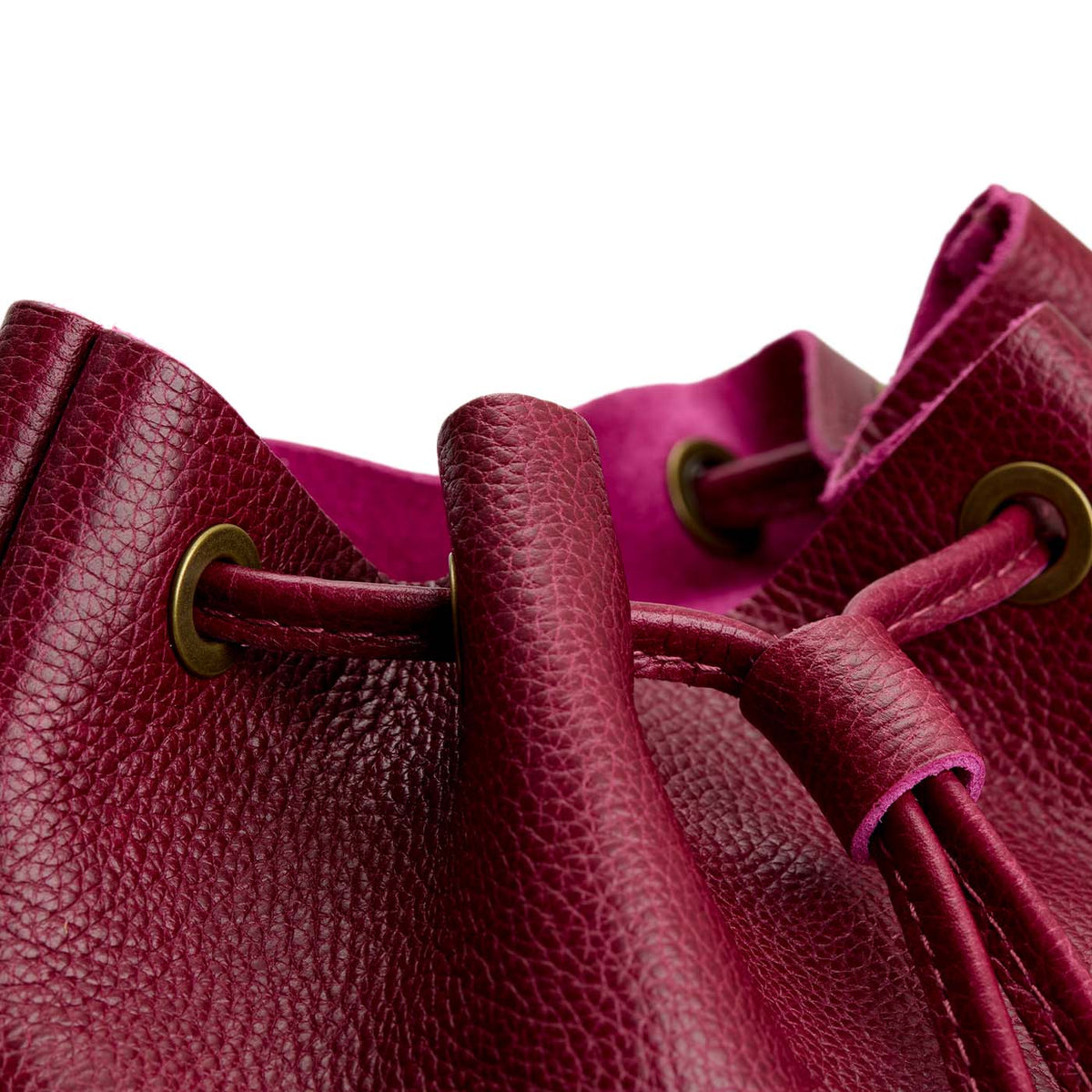Orchid | Close-up of slouchy crossbody bag with leather drawstring closure
