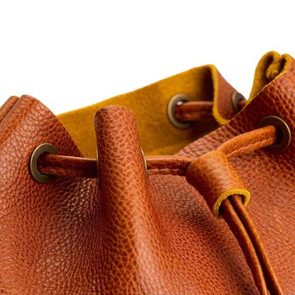 Sienna | Close-up of slouchy crossbody bag with leather drawstring closure