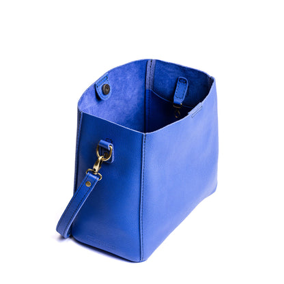 Astro Blue | symmetrical bucket bag with latch closure and removable crossbody strap