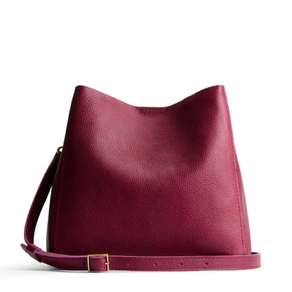 Orchid | symmetrical bucket bag with latch closure and removable crossbody strap