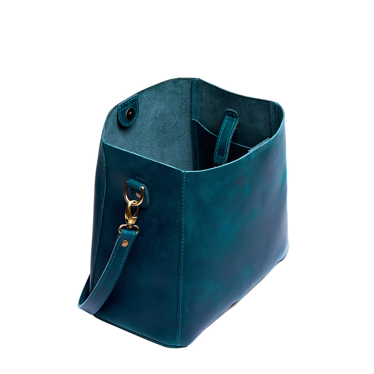 Westward Blue | Symmetrical bucket bag with latch closure and removable crossbody strap