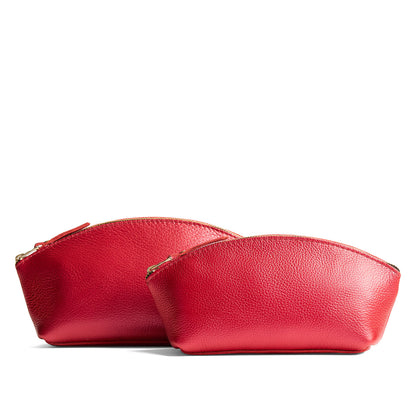 Reba Red | Spacious leather makeup bag with curved seams and top zipper