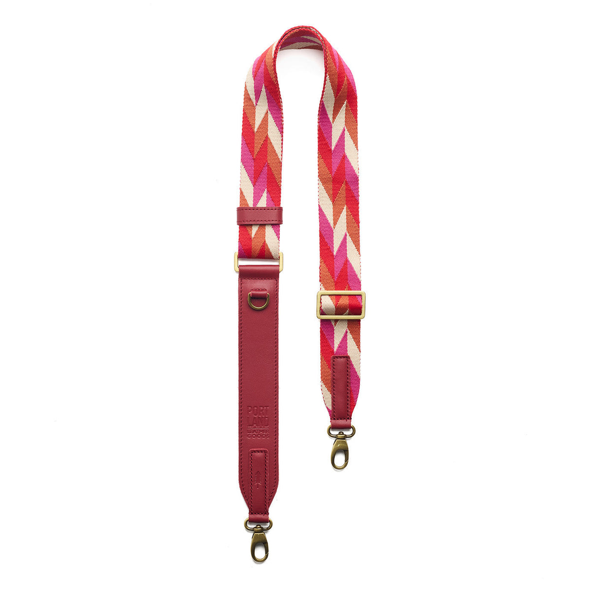 Tropical Punch | Patterned fabric and leather strap on a white background