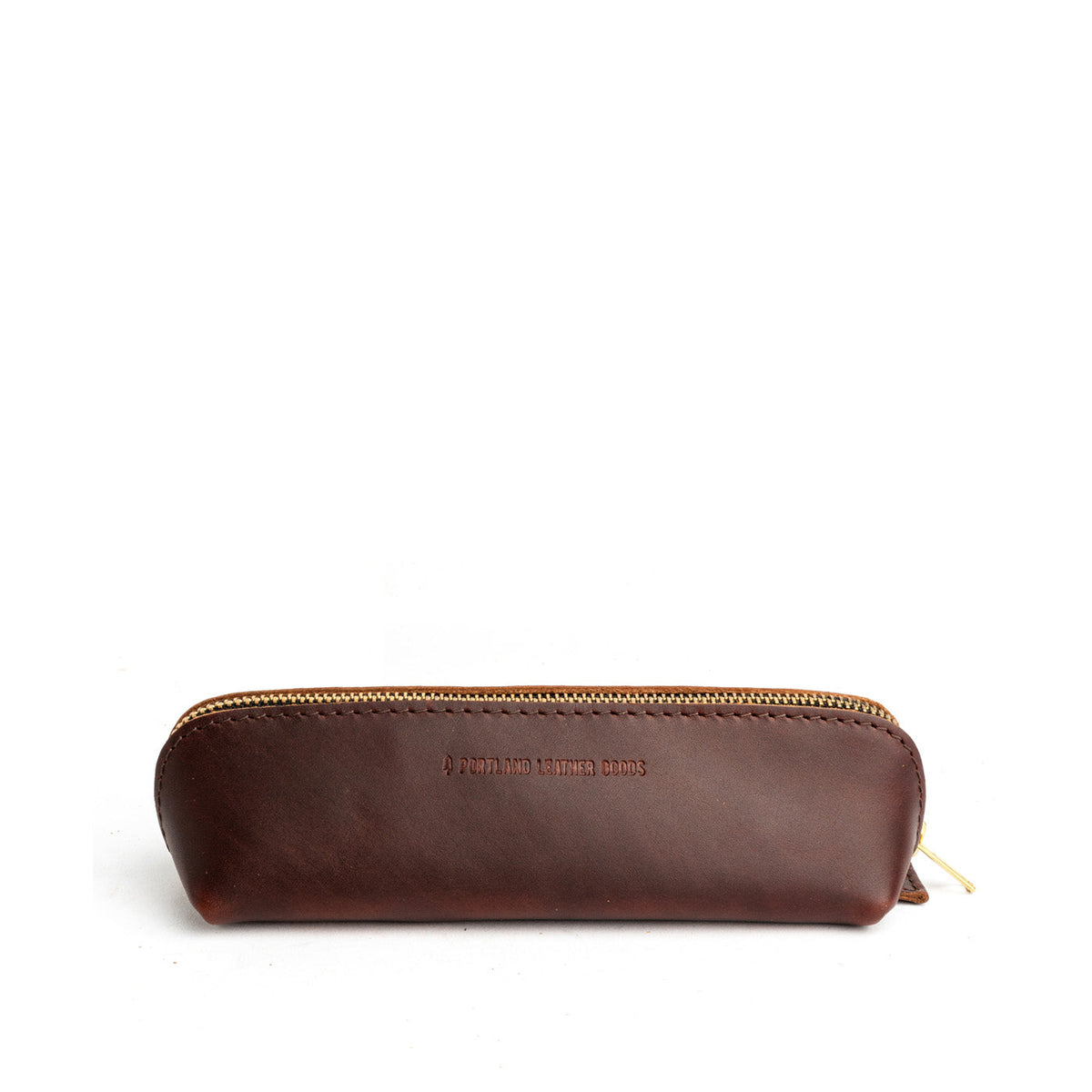 All Color: Cognac | Leather pouch with curved seams and top zipper
