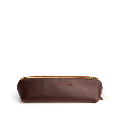 All Color: Cognac | Leather pouch with curved seams and top zipper