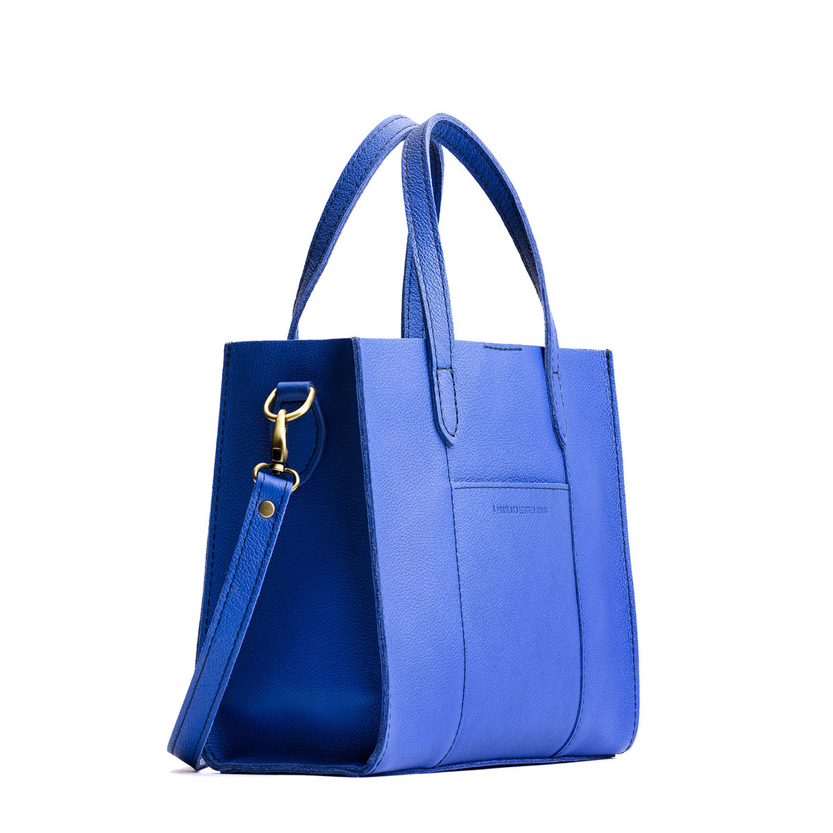 Astro Blue | Structured mid-size tote bag with overlapping panels and crossbody strap