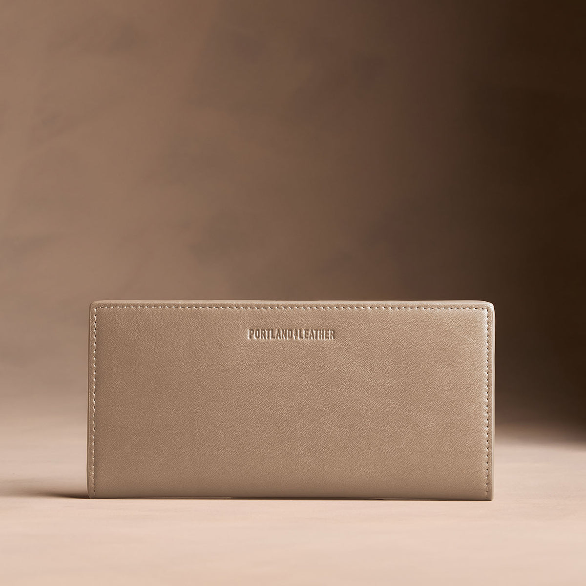 Satine*Large | Slim leather bifold wallet with multiple card slots and a zippered back pocket