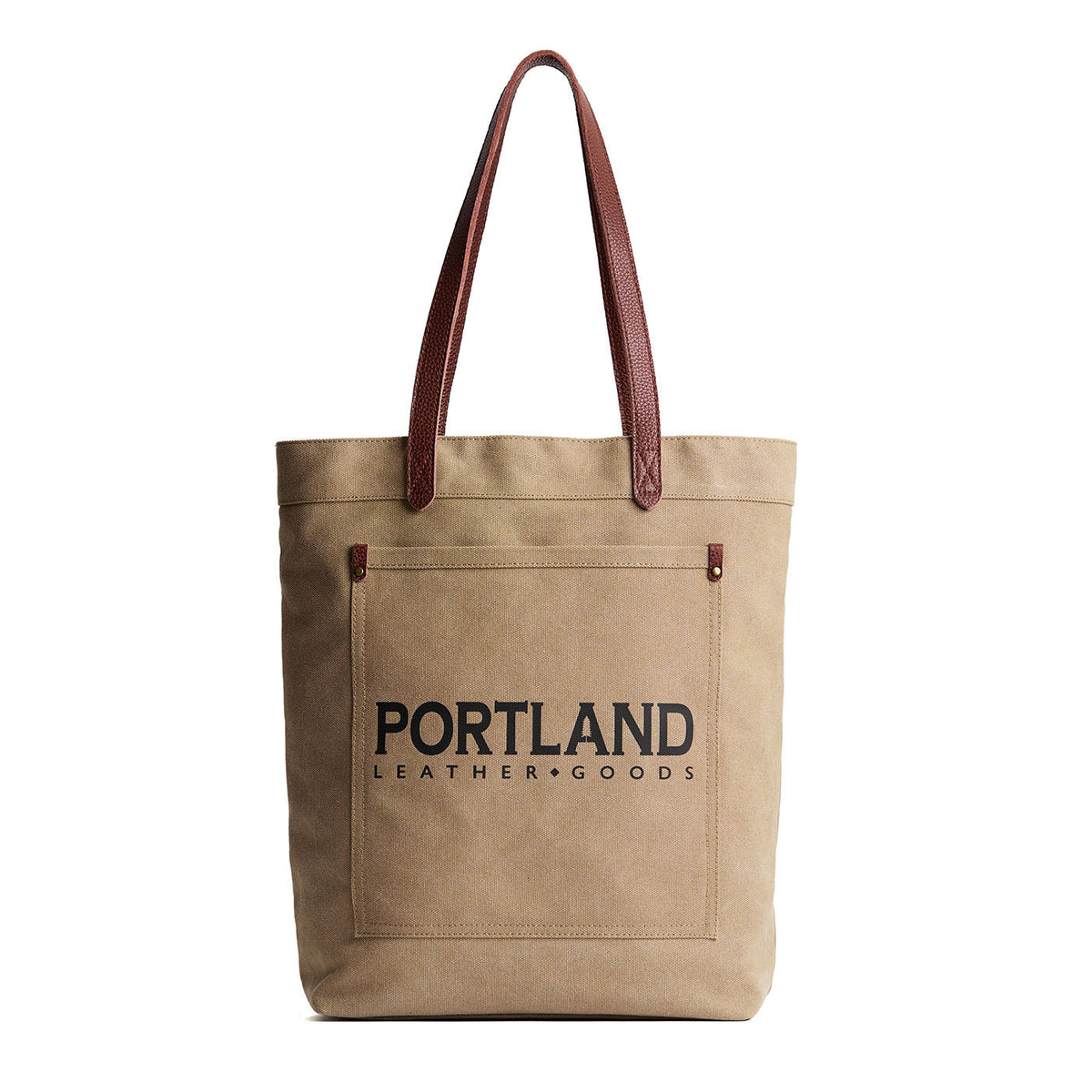 Beige tote bag with leather handles and 'Portland Leather Goods' text