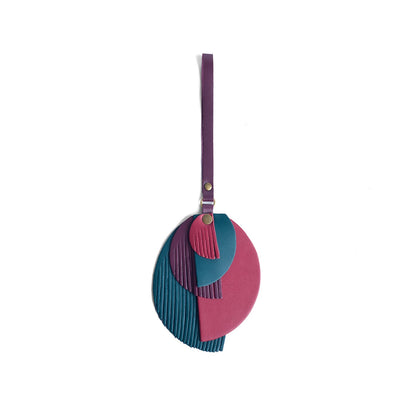 Enchanted | Intricately cut leather shapes and fringe