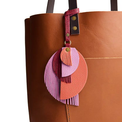Rebel | Intricately cut leather shapes and fringe