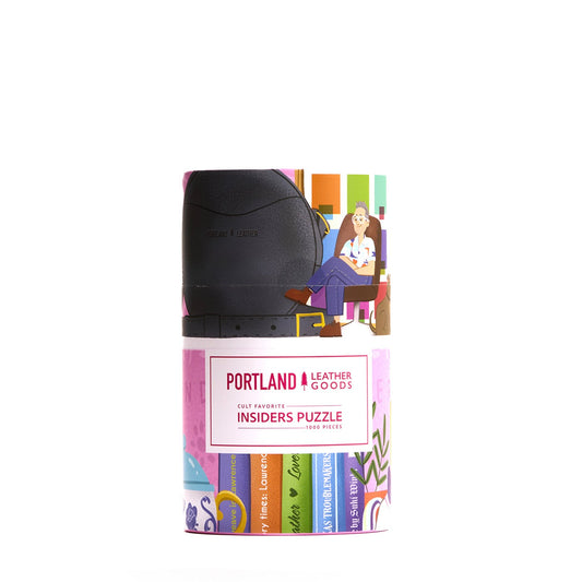 Colorful packaging of a puzzle with 'Portland Leather Goods' branding