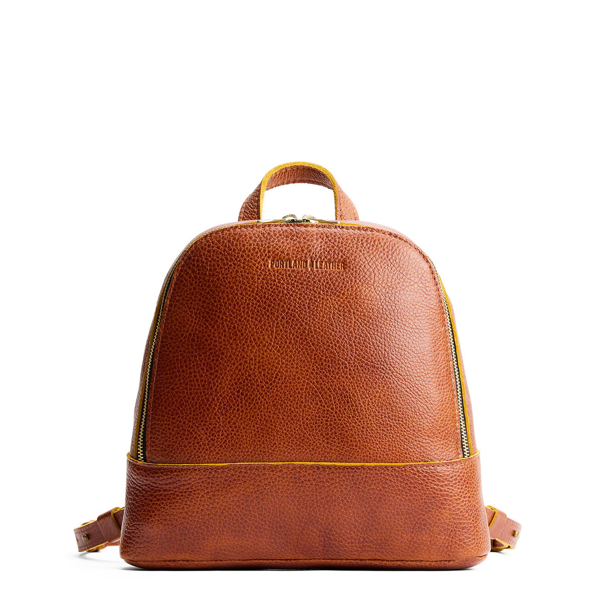 Sienna | Leather backpack with debossed Portland Leather logo on front, with zipper closure and straps with lobster clasps