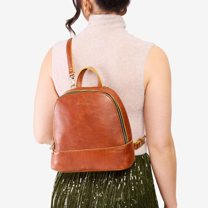 Sienna | Model wearing leather backpack sling bag style