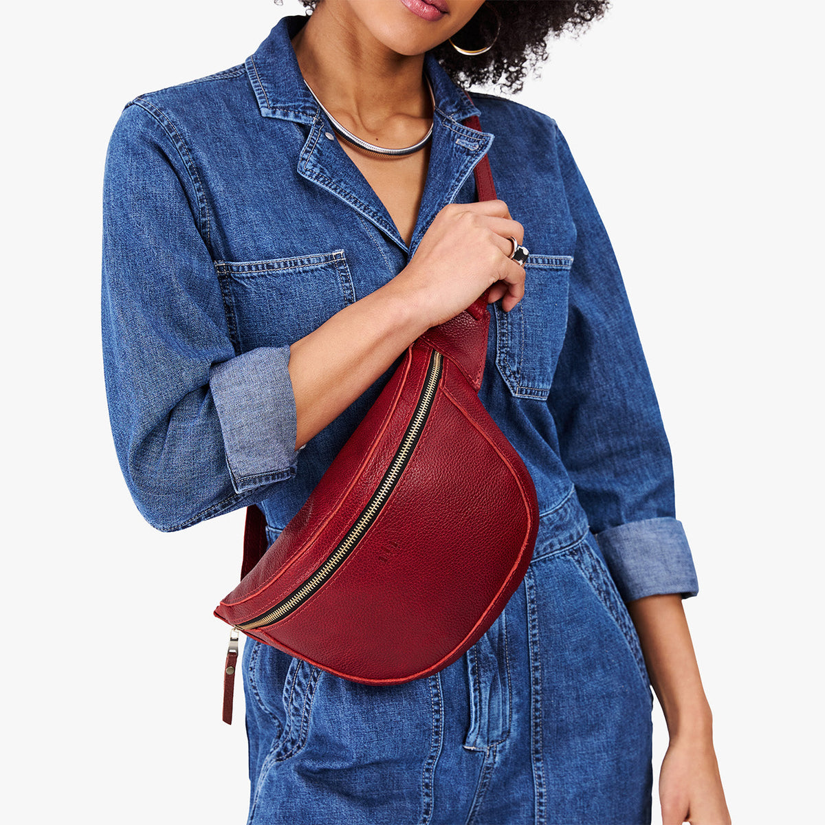 Chili Red | Model wearing a sling bag with front zipper