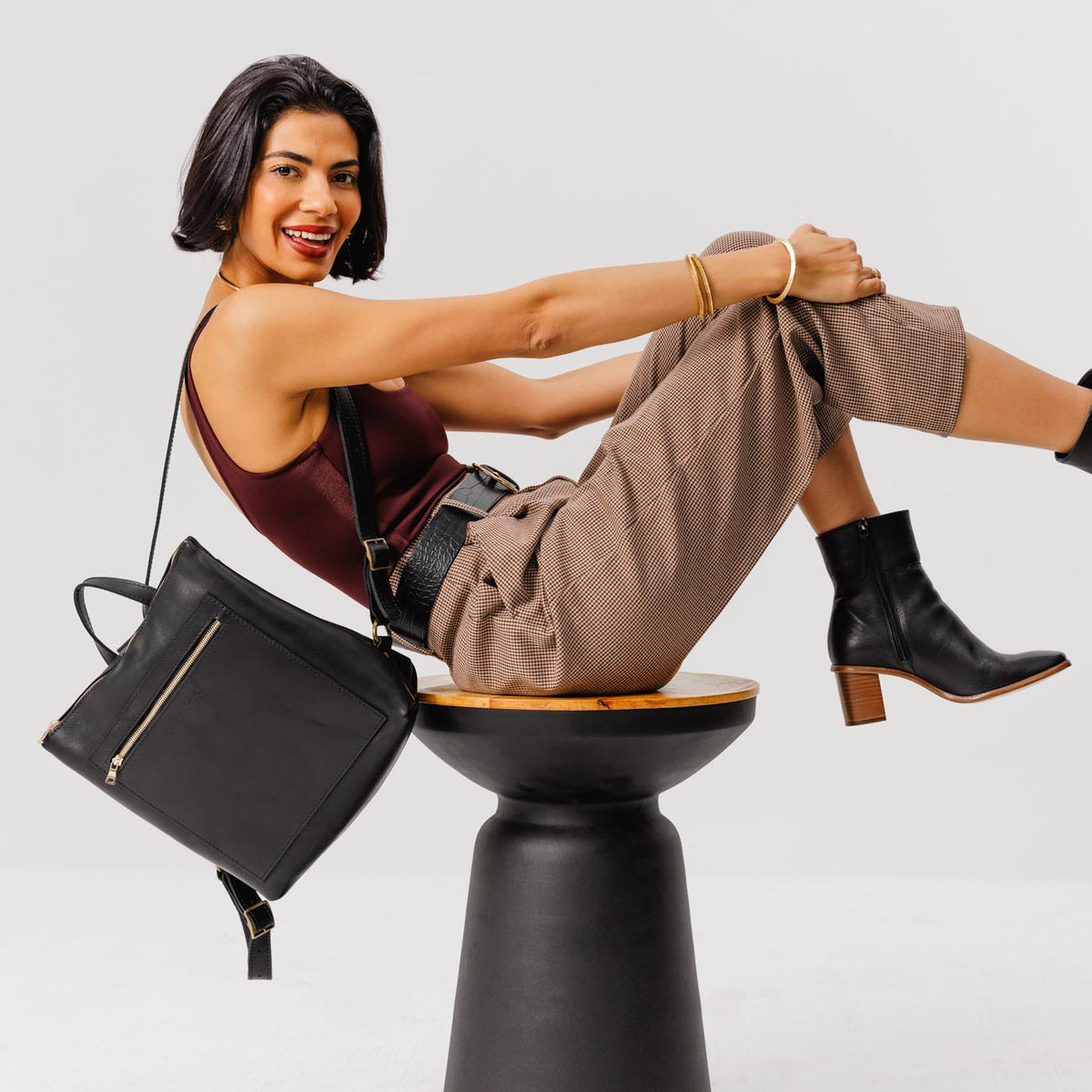 All Color: Black*Classic | Model wearing square slim leather tote backpack