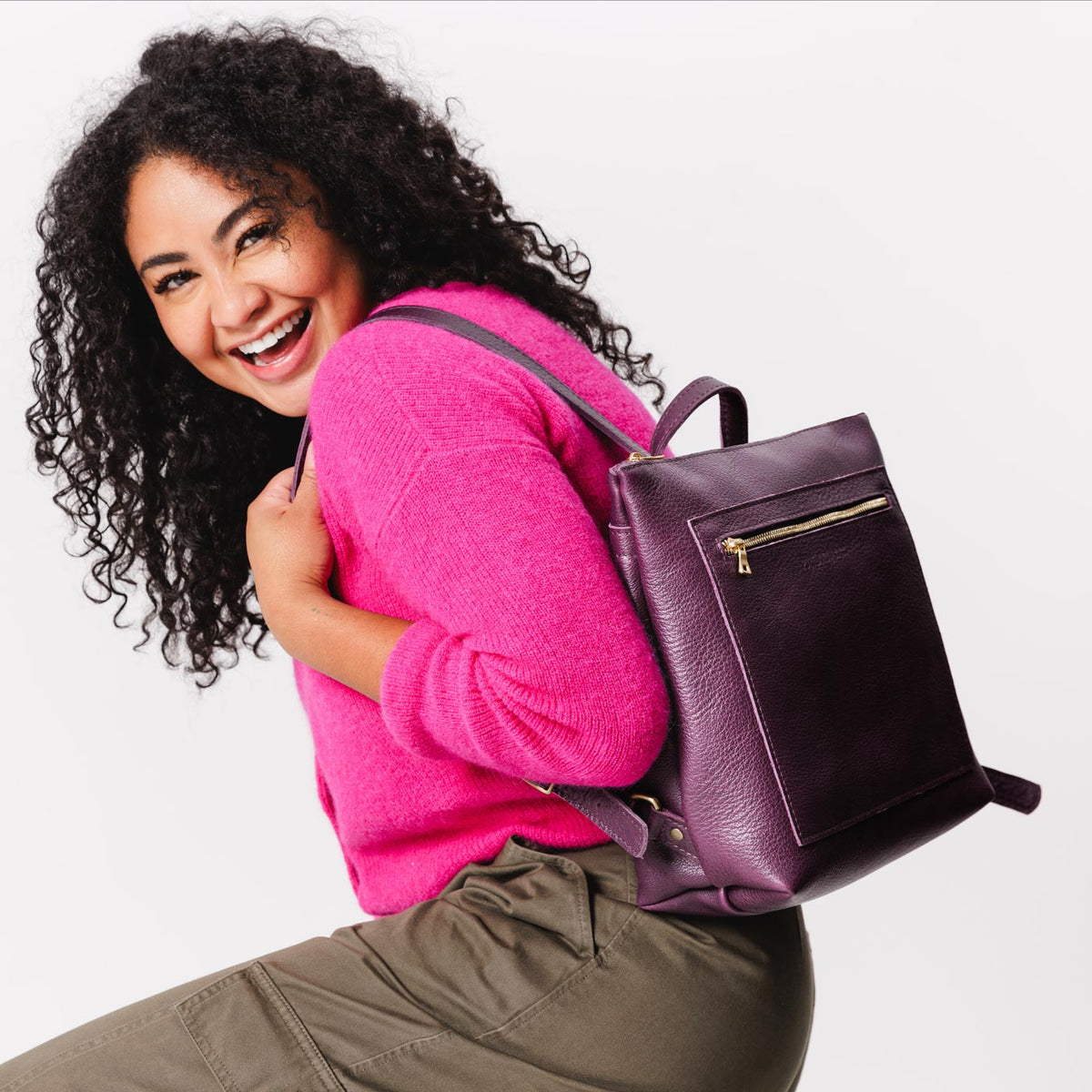 All Color: Plum*Classic | Model wearing square slim leather tote backpack
