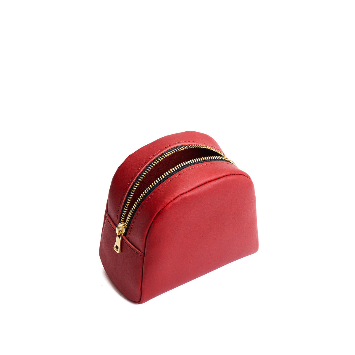 Ruby | Curved top leather pouch with zipper opening, flat base, and three metal tree emblems in front